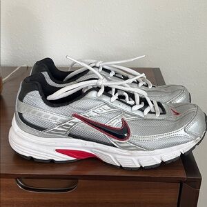 Nike men’s Silver/Black Athletic Sneakers with Red Trim